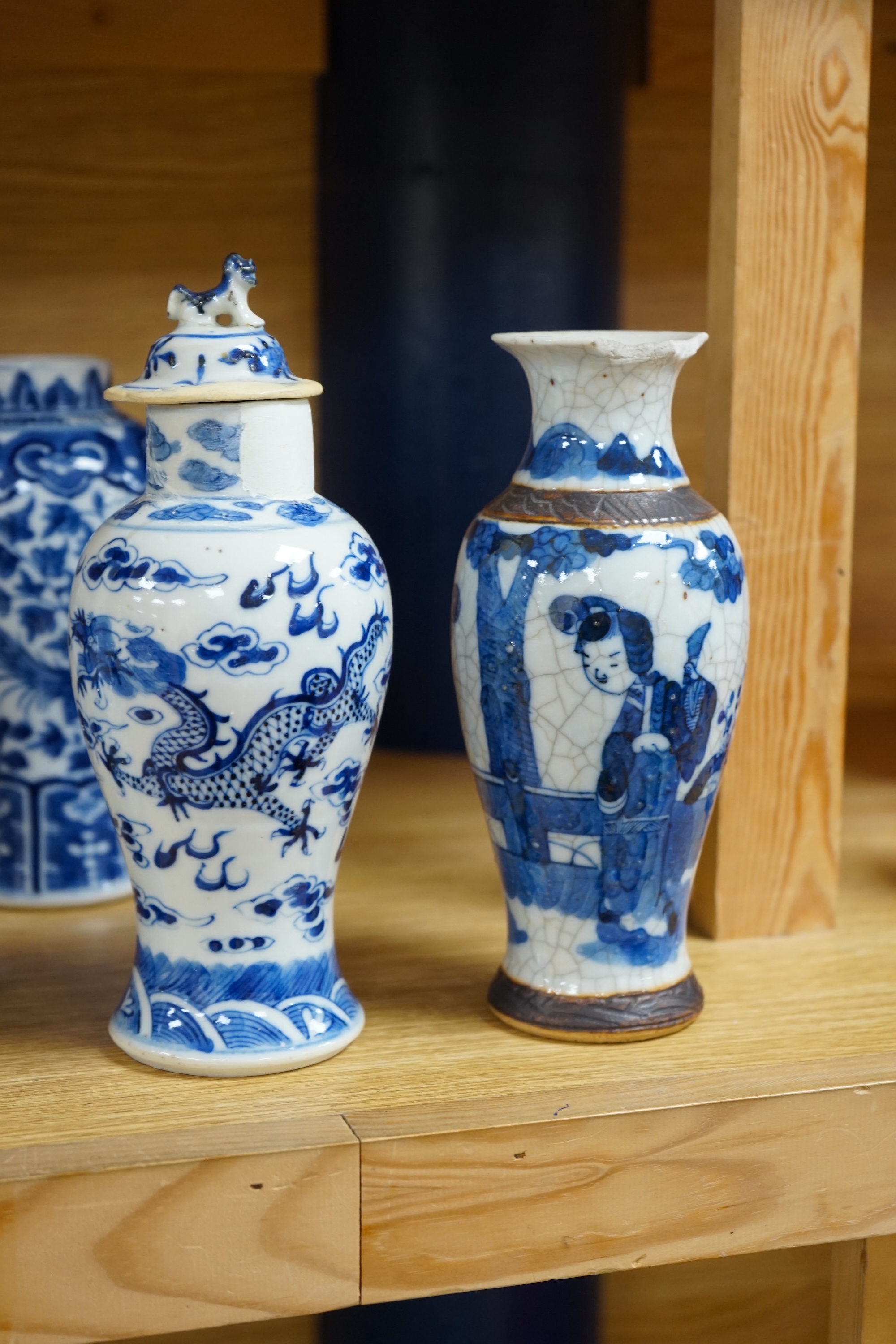 A collection of 19th and 20th century Chinese blue and white vases and tea bowls, largest 21cm high. Condition - varies, mostly poor